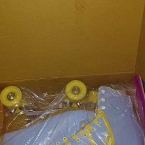 Blue and Yellow Impala Roller Skates